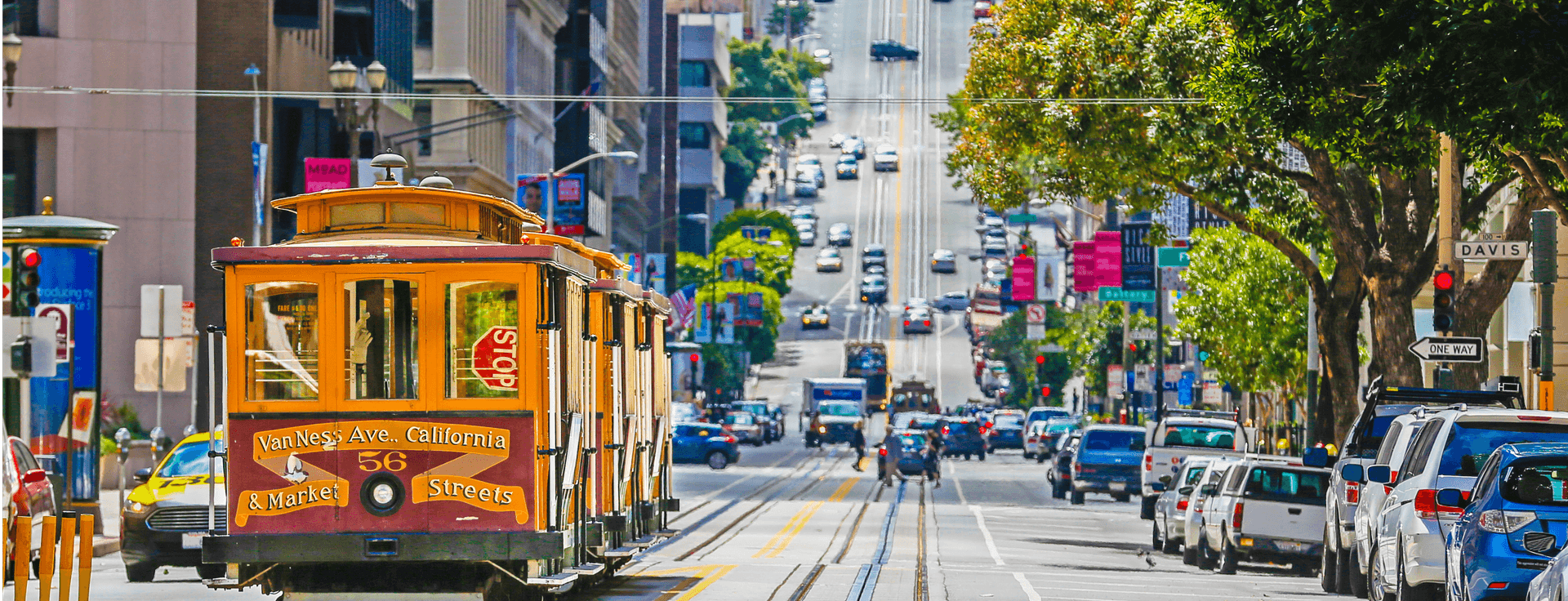 Professionally dressed individuals reading on their tablets and smartphones